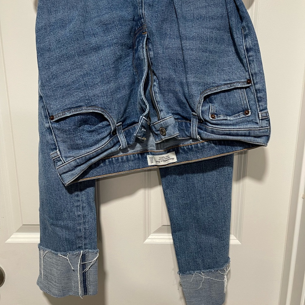 The Ankle Straight Ultra High Rise Jeans with folded cuffs